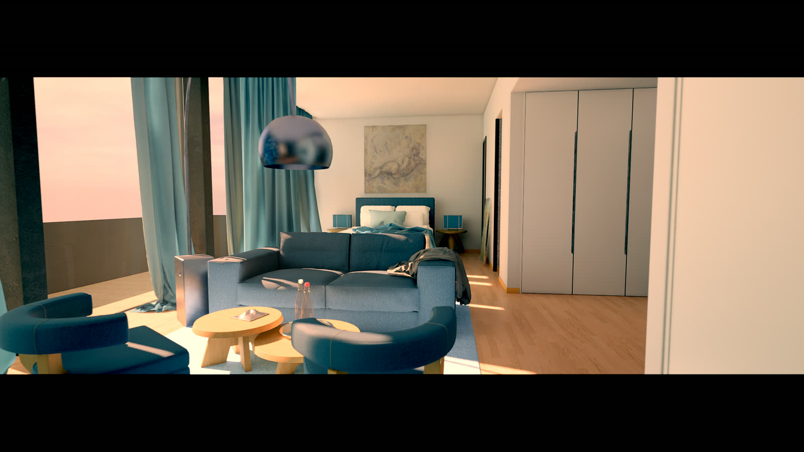 Salón de casa piloto con sofás azules y luz de atardecer