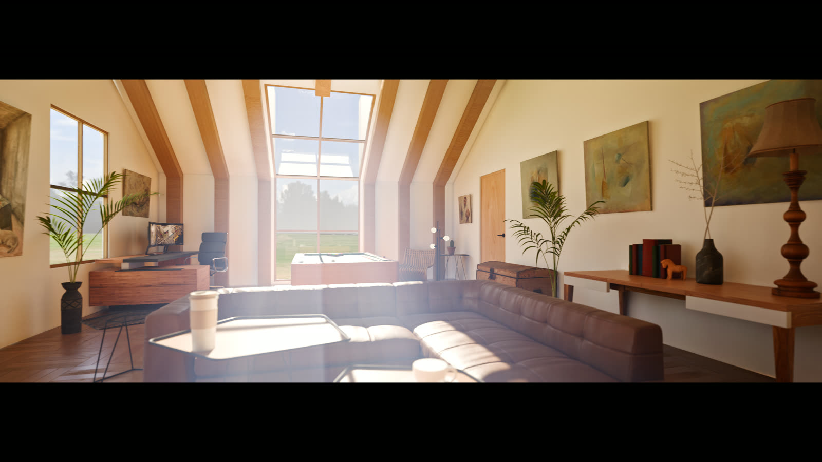Estudio abuhardillado con claraboyas y luz natural