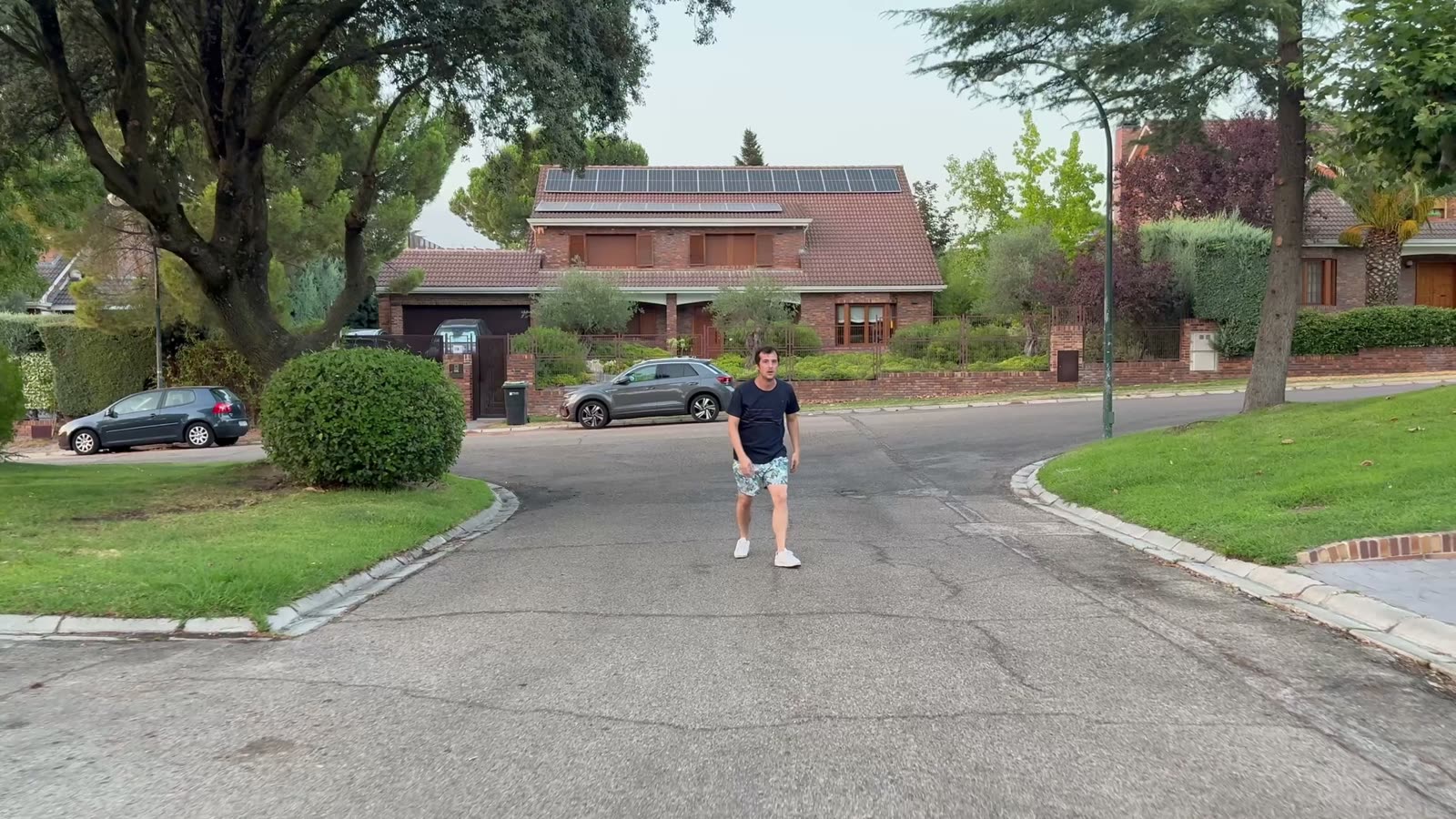 Motion capture outdoors, a figure on a residential street